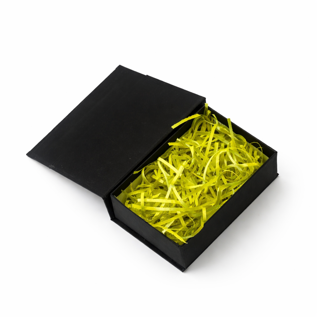 Neon yellow shredded paper filler for gift boxes, hampers,  and premium decorative packaging